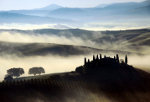 Morning mist in the Val d'Orcia near Siena in Tuscany