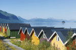 norway-Colorful camping cabins on the fjord shore